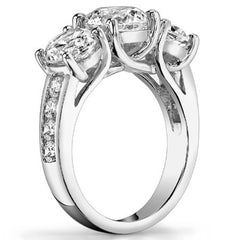 3.3ct (8mm/5mm) Round Brilliant Moissanite Trellis Three-Stone Ring
