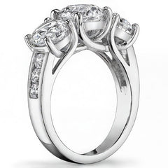 3.3ct (7.5mm/6mm) Round Brilliant Moissanite Trellis Three-Stone Ring