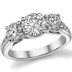 2.5ct (7mm/5mm) Round Brilliant Moissanite Trellis Three-Stone Ring