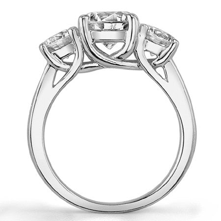 2.2ct (7mm/4.5mm) Round Brilliant Moissanite Trellis Three-Stone Ring