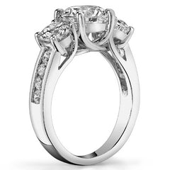 2.2ct (7mm/4.5mm) Round Brilliant Moissanite Trellis Three-Stone Ring