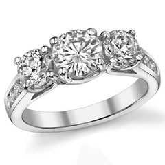 2.3ct (6.5mm/5mm) Round Brilliant Moissanite Trellis Three-Stone Ring