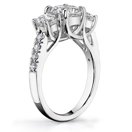 3.2ct (8mm/5mm) Round Brilliant Moissanite Trellis Three-Stone Ring