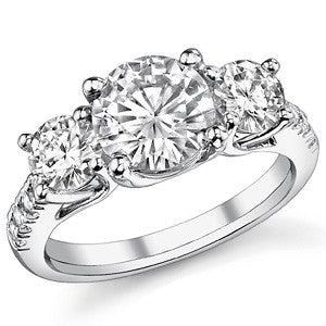 3.2ct (8mm/5mm) Round Brilliant Moissanite Trellis Three-Stone Ring