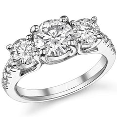 2.7ct (7.5mm/5mm) Round Brilliant Moissanite Trellis Three-Stone Ring