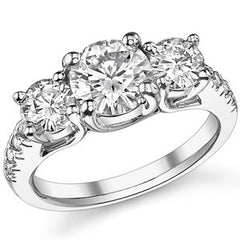 2.7ct (7.5mm/5mm) Round Brilliant Moissanite Trellis Three-Stone Ring