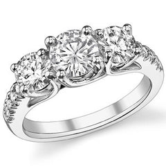 2.2ct (6.5mm/5mm) Round Brilliant Moissanite Trellis Three-Stone Ring