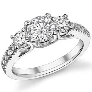 1.7ct (6.5mm/4mm) Round Brilliant Moissanite Trellis Three-Stone Ring
