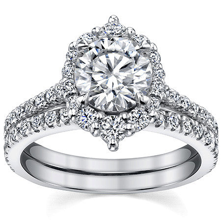 Round Brilliant Moissanite Graduated Halo Engagement Ring