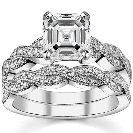 Round Brilliant Moissanite & Diamond Twisted Milgrain Engagement Ring