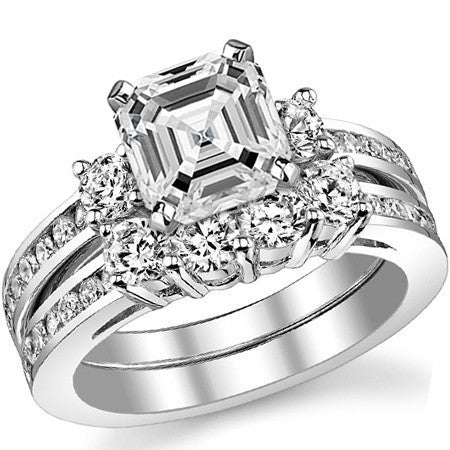 Round Brilliant Moissanite Three-Stone Style Engagement Ring, 0.58ct