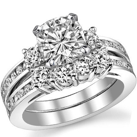 Round Brilliant Moissanite Three-Stone Style Engagement Ring, 0.58ct
