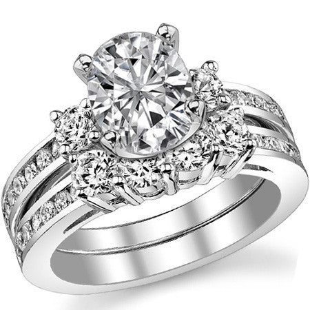 Round Brilliant Moissanite Three-Stone Style Engagement Ring, 0.58ct