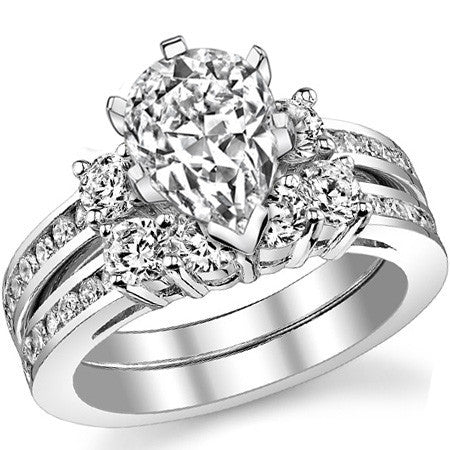 Round Brilliant Moissanite Three-Stone Style Engagement Ring, 0.58ct