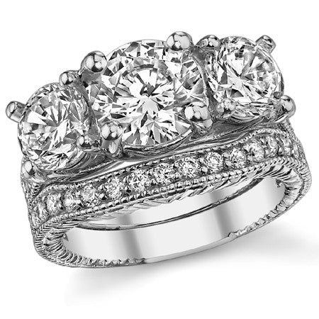 4.2ct (8mm,6.5mm) Round Brilliant Moissanite Antique Trellis 3-Stone Ring