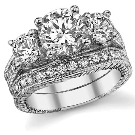3.2ct (8mm,5mm) Round Brilliant Moissanite Antique Trellis 3-Stone Ring