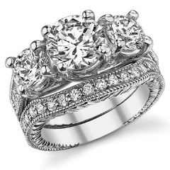 3.1ct (7.5mm,6mm) Round Brilliant Moissanite Antique Trellis 3-Stone Ring