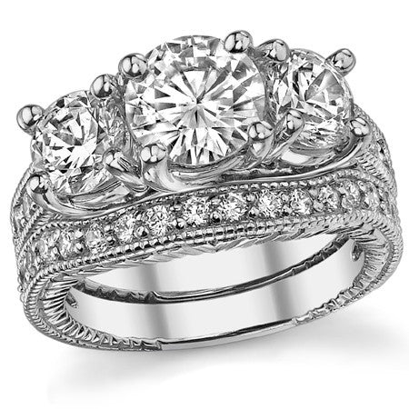 2.9ct (7mm,6mm) Round Brilliant Moissanite Antique Trellis 3-Stone Ring
