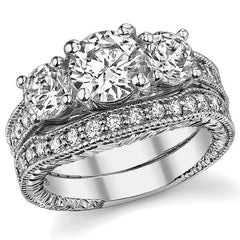 2.4ct (7mm,5mm) Round Brilliant Moissanite Antique Trellis 3-Stone Ring