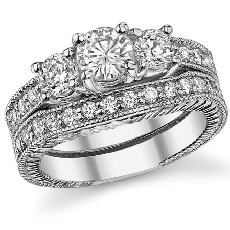 1.1ct (5mm,4mm) Round Brilliant Moissanite Antique Trellis 3-Stone Ring