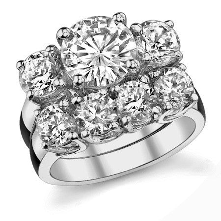 3.0ct (8.0/5.0mm) Round Brilliant Moissanite Trellis 3 Stone Ring