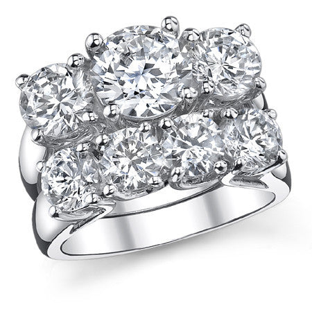 3.0ct (7.5/6.0mm) Round Brilliant Moissanite Trellis 3 Stone Ring