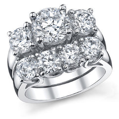 2.5ct (7.5/5.0mm) Round Brilliant Moissanite Trellis 3 Stone Ring