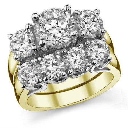 2.5ct (7.5/5.0mm) Round Brilliant Moissanite Trellis 3 Stone Ring
