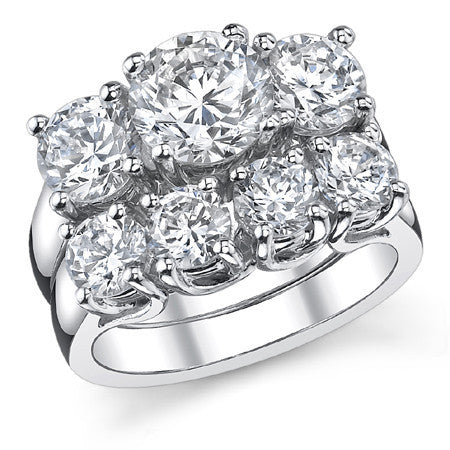 2.7ct (7.0/6.0mm) Round Brilliant Moissanite Trellis 3 Stone Ring