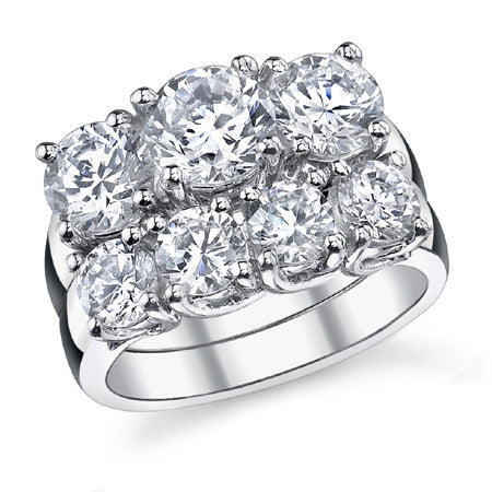 2.5ct (6.5/6.0mm) Round Brilliant Moissanite Trellis 3 Stone Ring