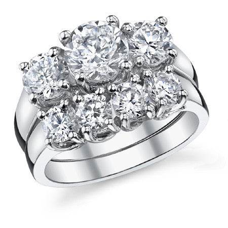2.0ct (6.5/5.0mm) Round Brilliant Moissanite Trellis 3 Stone Ring