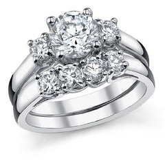 1.3ct (6.5/3.5mm) Round Brilliant Moissanite Trellis 3 Stone Ring