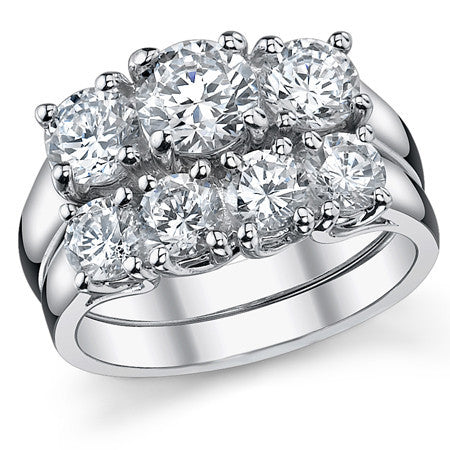 1.75ct (6mm/5mm) Round Brilliant Moissanite Trellis 3 Stone Ring