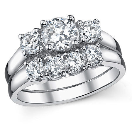 1.25ct (6mm/4mm) Round Brilliant Moissanite Trellis 3 Stone Ring