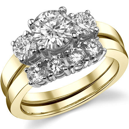1.5ct (6.5mm,4mm) Round Brilliant Moissanite Three Stone Ring