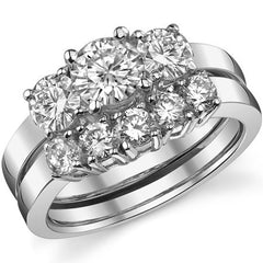1.4ct (6mm,4.5mm) Round Brilliant Moissanite Three Stone Ring