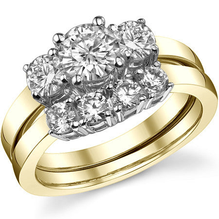 1.25ct (6mm,4mm) Round Brilliant Moissanite Three Stone Ring