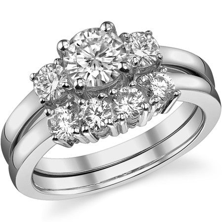 1.05ct (6mm,3.5mm) Round Brilliant Moissanite Three Stone Ring