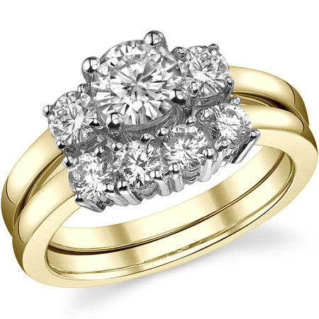 1.05ct (6mm,3.5mm) Round Brilliant Moissanite Three Stone Ring