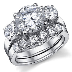 4.5ct (9.5mm,5mm) Round Brilliant Moissanite Three Stone Ring