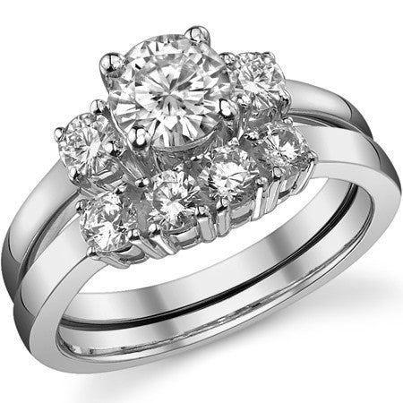 0.95ct (6mm,3mm) Round Brilliant Moissanite Three Stone Ring