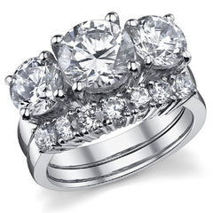 5.0ct (9.0mm,6.5mm) Round Brilliant Moissanite Three Stone Ring