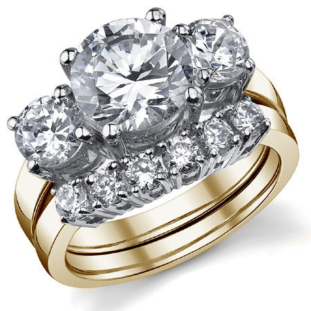 4.5ct (9.0mm,6.0mm) Round Brilliant Moissanite Three Stone Ring