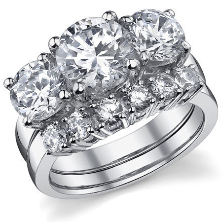 4.5ct (8.5mm,6.5mm) Round Brilliant Moissanite Three Stone Ring