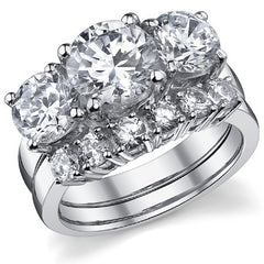 4.5ct (8.5mm,6.5mm) Round Brilliant Moissanite Three Stone Ring