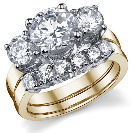 3.5ct (8.5mm,5.0mm) Round Brilliant Moissanite Three Stone Ring