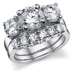 3.5ct (8mm,6.0mm) Round Brilliant Moissanite Three Stone Ring