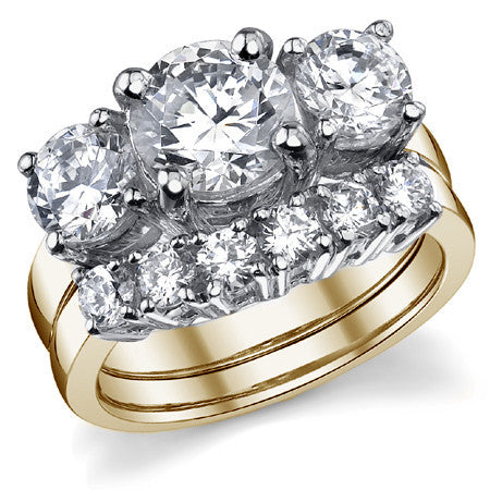 3.5ct (8mm,6.0mm) Round Brilliant Moissanite Three Stone Ring