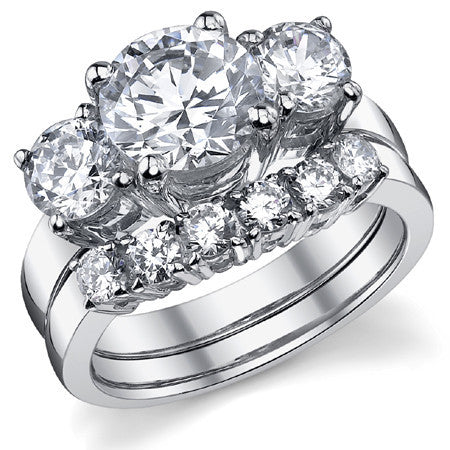 3.0ct (8.0mm,5.0mm) Round Brilliant Moissanite Three Stone Ring