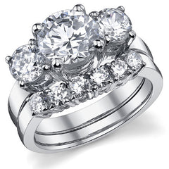 3.0ct (8.0mm,5.0mm) Round Brilliant Moissanite Three Stone Ring